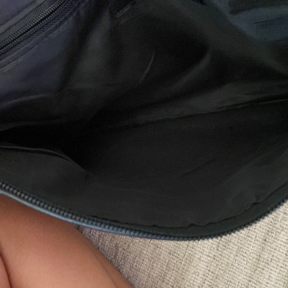 It’s a H and M bag black leather with gold points at the end and it’s spacious - Picture 6 of 7